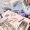 Top view of female dentist in sterile gloves cutting braces wire while sitting at the table with orthodontic instruments and tools. Woman orthodontist preparing wire for braces attachment.